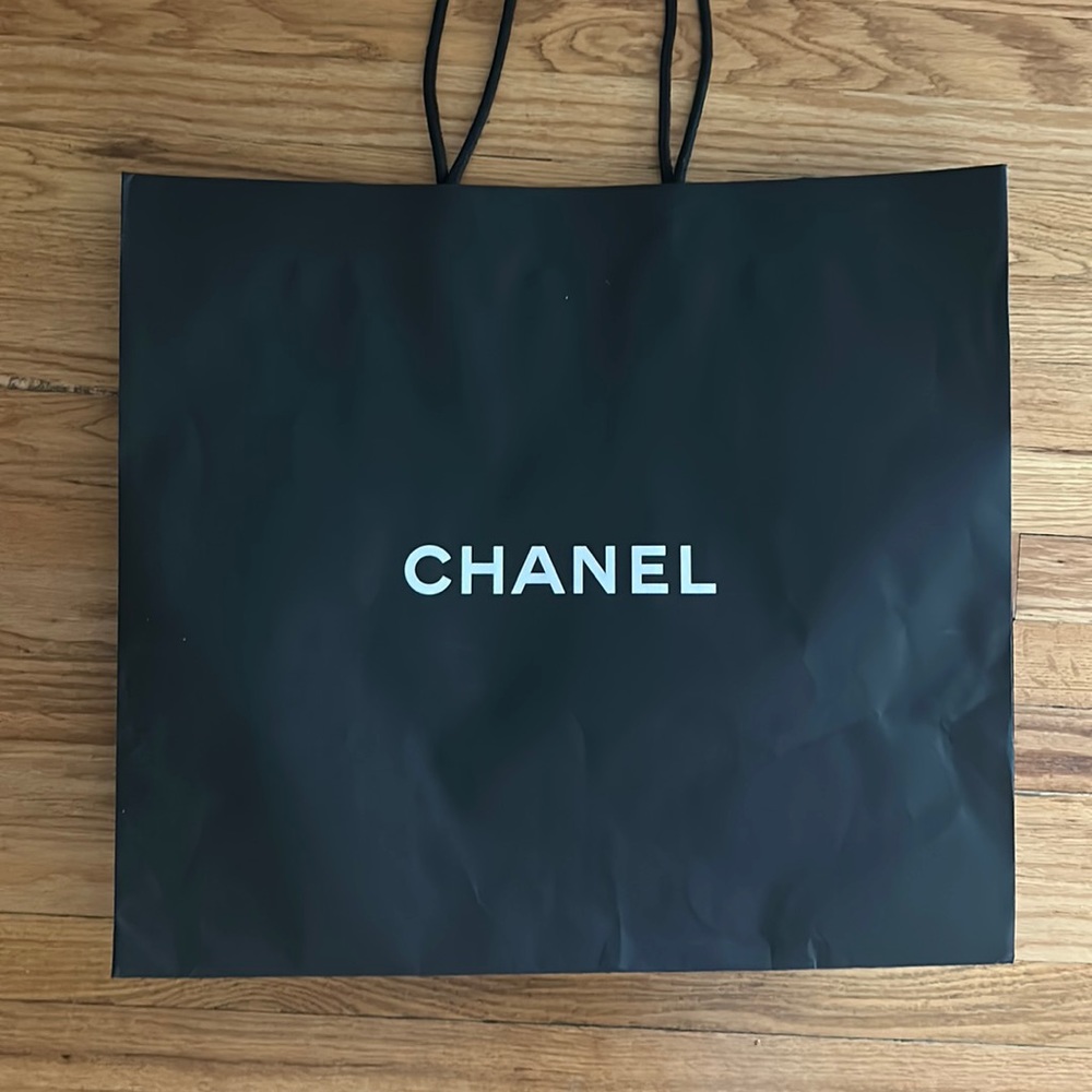 This is an empty Chanel shopping bag